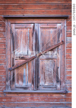 Vintage wooden window on old wall Vintage wooden window on old wall 105789860