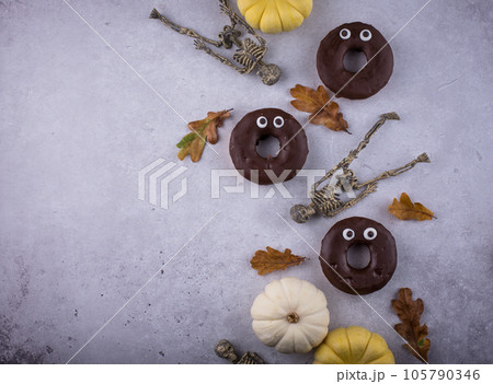 Halloween festive donuts with eyes. Halloween festive donuts with eyes. 105790346