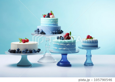 Blue cakes on a blue background. A variety of confectionery products. 105790546