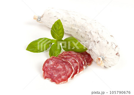 Salami sliced on the white background 105790676