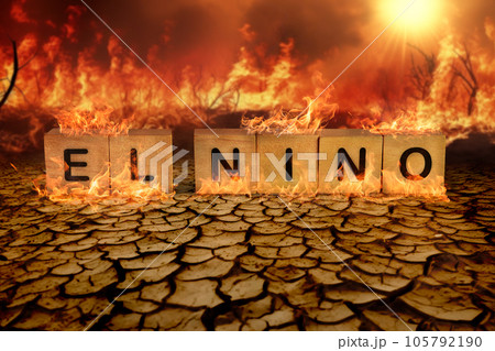 Wooden block of El Nino on the cracked mud and wild fire background. climate change and global warming concept Wooden block of El Nino on the cracked mud and wild fire background. climate change and global warming concept 105792190