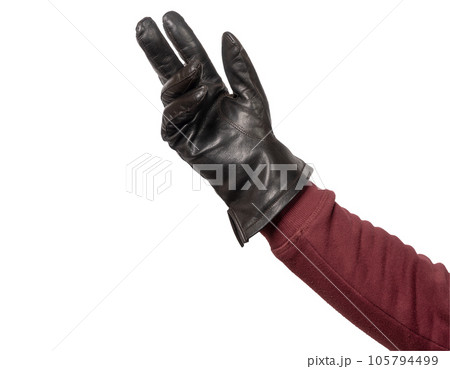 a hand with black leather glove worn a hand with black leather glove worn 105794499