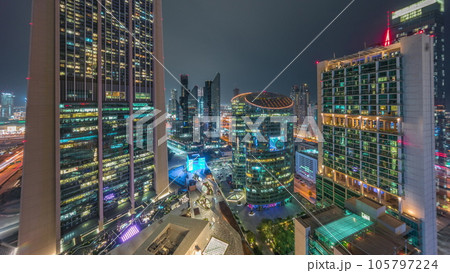 Dubai international financial center skyscrapers aerial day to night timelapse. 105797224