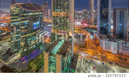 Dubai international financial center skyscrapers aerial day to night timelapse. 105797225