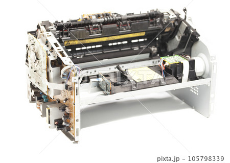 Disassembled laser printer isolated on white background Disassembled laser printer isolated on white background 105798339