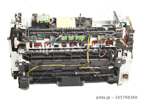Disassembled laser printer isolated on white background Disassembled laser printer isolated on white background 105798360
