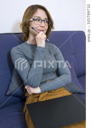 Portrait of a female psychotherapist with glasses. Close-up 105799710