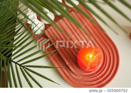 Burning scented candles for relax on black background Burning scented candles for relax on black background 105800702