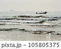 A boat floating on the sea in the brilliant dawn 105805375