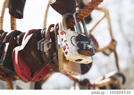 Old padlock. Door lock in the form of a heart. 105808530