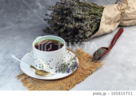 Bouquet of dried lavender, lavender soap, oil and candle tea. Healthy lifestyle, light background. Bouquet of dried lavender, lavender soap, oil and candle tea. Healthy lifestyle, light background. 105815751