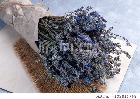 Bouquet of dried lavender, lavender soap, oil and candle tea. Healthy lifestyle, light background. 105815768