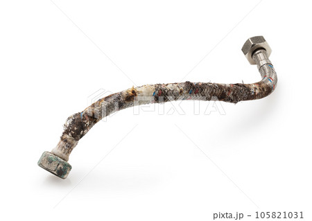 Damaged water hose with traces of corrosion, deformation of the protective layer and limescale isolated on a white background Damaged water hose with traces of corrosion, deformation of the protective layer and limescale isolated on a white background 105821031