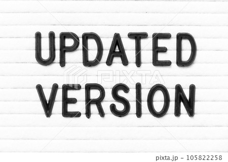 Black color letter in word updated version on white felt board background Black color letter in word updated version on white felt board background 105822258