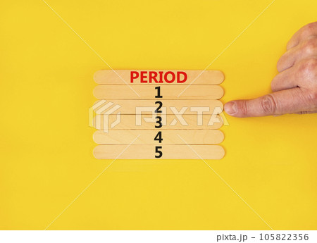 Time to period 2 symbol. Concept word Period 1 2 3 4 5 on wooden sticks. Businessman hand. Beautiful yellow table yellow background. Business planning and time to period 2 concept. Copy space. 105822356
