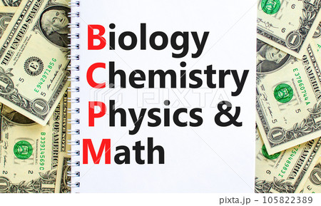BCPM biology chemistry physics math symbol. Concept words BCPM biology chemistry physics math on the note on beautiful dollar background. Business BCPM biology chemistry physics math concept. 105822389