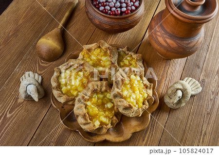 Karelian pasty with apples and apricot Karelian pasty with apples and apricot 105824017