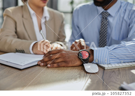 Financial advisor asking for womans signature for insurance, legal paperwork or claim document Financial advisor asking for womans signature for insurance, legal paperwork or claim document 105827352