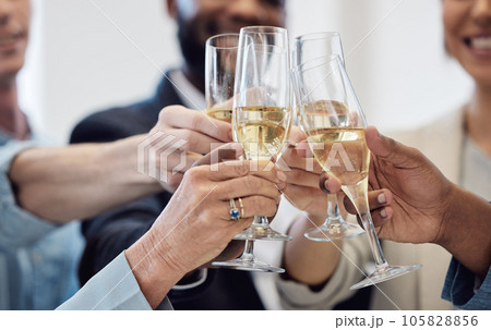 Champagne, toast and business people for celebration, success and social event, company party and happy career. Wine glasses, alcohol and professional woman, men or team hands cheers for work goals Champagne, toast and business people for celebration, success and social event, company party and happy career. Wine glasses, alcohol and professional woman, men or team hands cheers for work goals 105828856