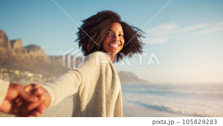 Beach, love and woman holding hands with her boyfriend while on a summer vacation or weekend trip. Travel, outdoor and happy female person walking by the ocean with affection on a tropical holiday. Beach, love and woman holding hands with her boyfriend while on a summer vacation or weekend trip. Travel, outdoor and happy female person walking by the ocean with affection on a tropical holiday. 105829283