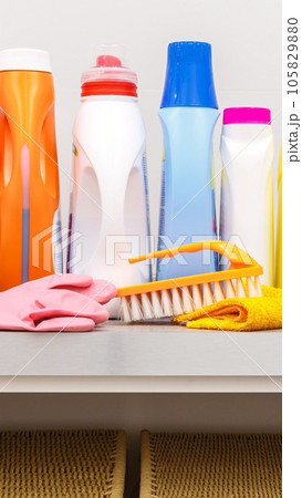Cleaning items on the table in laundry room 105829880