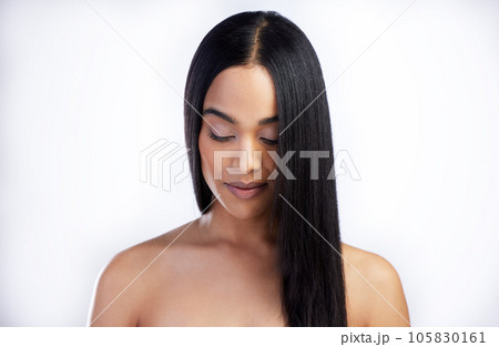 Serious, face and straight hair of woman in studio isolated on a white background for skincare. Growth, haircare and female model in natural makeup, cosmetics and salon treatment for hairstyle mockup Serious, face and straight hair of woman in studio isolated on a white background for skincare. Growth, haircare and female model in natural makeup, cosmetics and salon treatment for hairstyle mockup 105830161