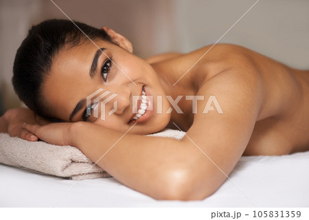 Portrait of happy girl, smile or massage to relax for zen resting or wellness physical therapy in spa hotel. Face of woman smiling in salon resort for body healing treatment or holistic detox therapy 105831359