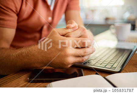 Man hands, laptop and book for remote work, planning or research in the kitchen. Businessperson, working or entrepreneur with a notebook and computer at a table in the morning in a house Man hands, laptop and book for remote work, planning or research in the kitchen. Businessperson, working or entrepreneur with a notebook and computer at a table in the morning in a house 105831787