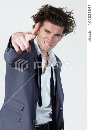 Business man, finger gun and studio portrait with messy suit, silly and mental health by white background. Isolated businessman, shooting sign and emoji with wrinkled clothes, hair and crazy face 105831842