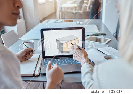 Architect, design engineer or contractor pointing to a 3d digital model on a laptop screen, discussing a plan or idea with a colleague in a meeting. Two business people talking about a work project 105832113