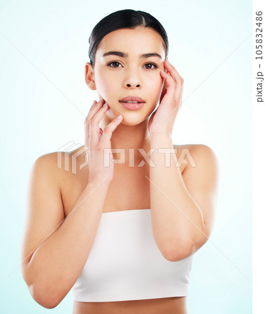 Portrait, skincare and confident woman in studio isolated on a white background. Face, natural beauty and female model with makeup, cosmetics or facial treatment, healthy skin or aesthetic wellness 105832486