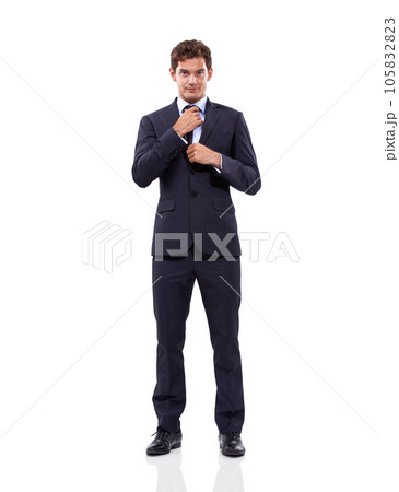 Let me build your success. Studio shot of a well-dressed man against a white background. Let me build your success. Studio shot of a well-dressed man against a white background. 105832823