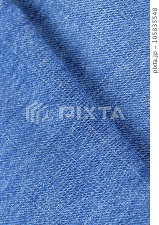 details of a blue denim fabric made of natural cotton 105835548