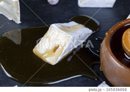 pieces of cream cheese with white mold 105836008