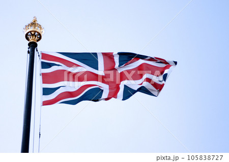 British flag waving atop of its pole 105838727
