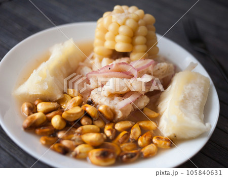Peruvian traditional dish.fish ceviche with yuka and corn Peruvian traditional dish.fish ceviche with yuka and corn 105840631