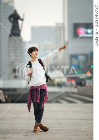 A young man traveling in Seoul, South Korea, with a backpack 105840787