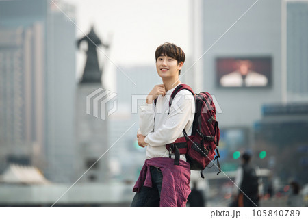 A young man traveling in Seoul, South Korea, with a backpack 105840789