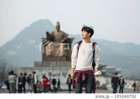 A young man traveling in Seoul, South Korea, with a backpack 105840792