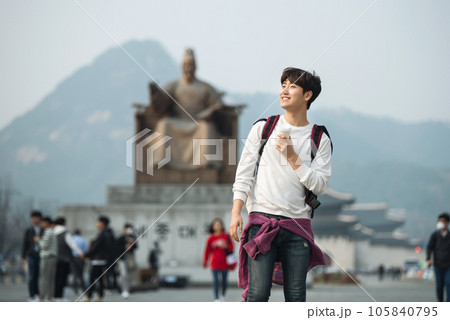 A young man traveling in Seoul, South Korea, with a backpack 105840795