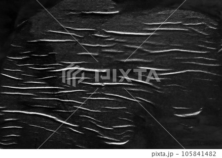Black crumpled and creased paper poster texture background 105841482