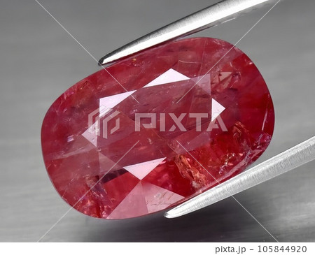 Natural gemstone pink sapphire isolated on white background Natural gemstone pink sapphire isolated on white background 105844920