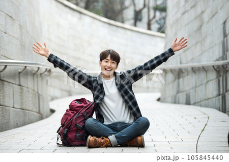 Young male college student traveling with a backpack in Korea 105845440