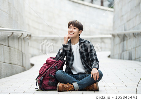 Young male college student traveling with a backpack in Korea 105845441