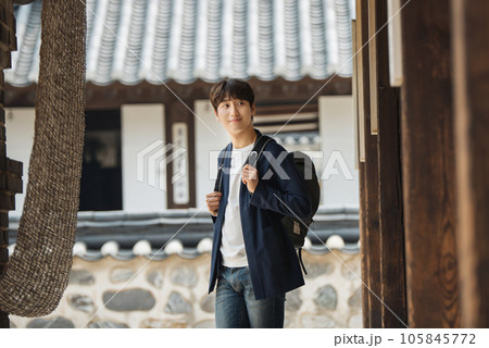 Young male college student traveling with a backpack in Korea 105845772