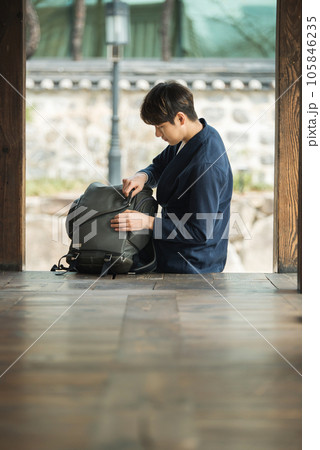 Young male college student traveling with a backpack in Korea 105846235