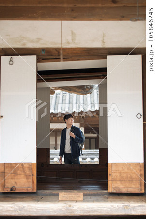 Young male college student traveling with a backpack in Korea 105846245