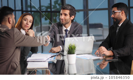 Young team of coworkers making great business discussion in modern coworking office. Young team of coworkers making great business discussion in modern coworking office. 105846350