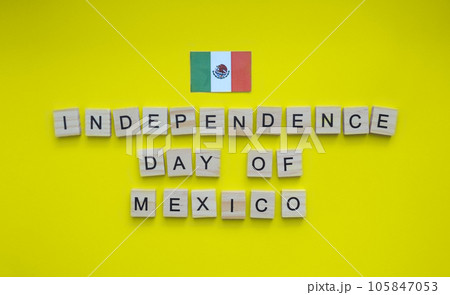 September 16, Independence Day of Mexico, flag of Mexico, minimalistic banner with the inscription in wooden letters on a yellow background 105847053