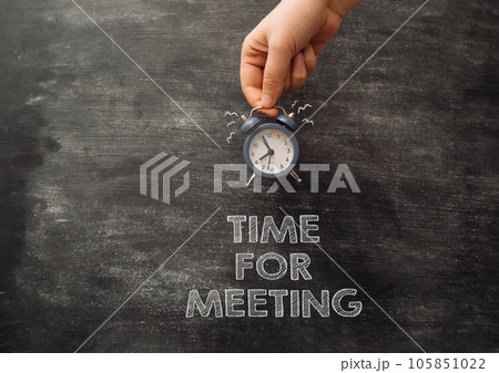 chalk text time for meeting on the blackboard chalk text time for meeting on the blackboard 105851022